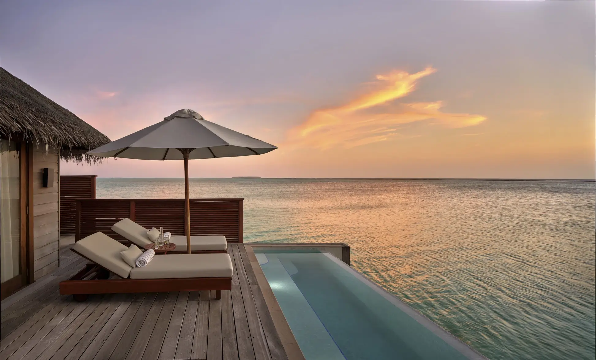 Deluxe Water Villa pool deck over the lagoon